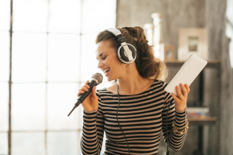 Woman singing in her apartment